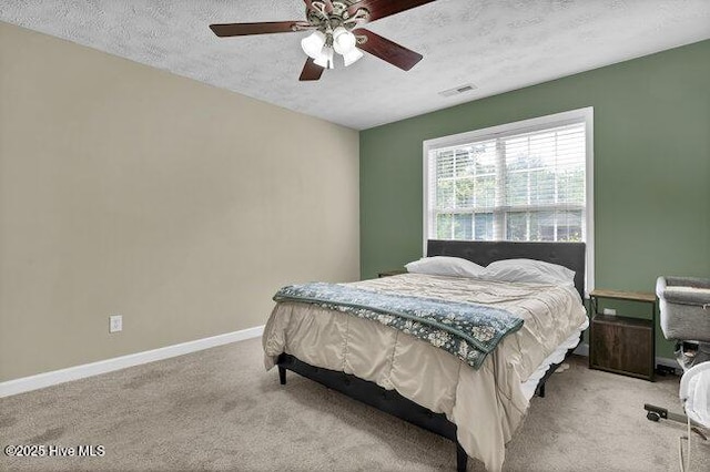 102 Rocky Ct, Richlands, NC 28574 - bedroom featuring carpet, a textured ceiling, baseboards, and ceiling fan