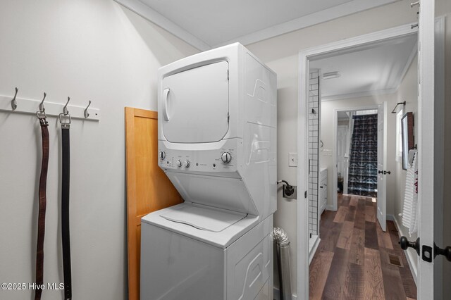105 N Main St, Bath, NC 27808 - washroom with stacked washer / drying machine and dark wood-style flooring