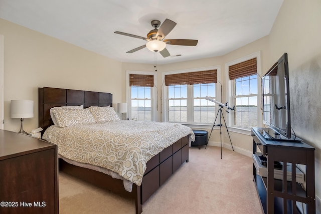 118 Durant St, Hertford, NC 27944 - bedroom with light colored carpet, baseboards, and a ceiling fan