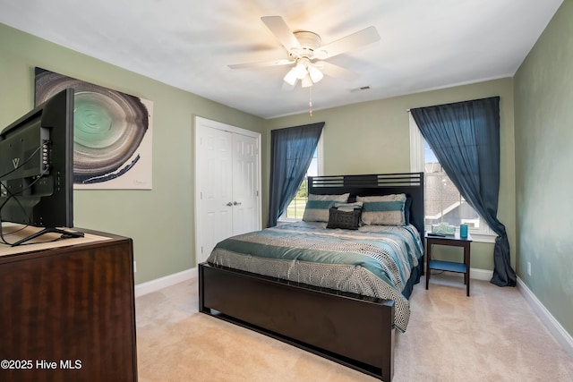 118 Durant St, Hertford, NC 27944 - carpeted bedroom with baseboards, a closet, and a ceiling fan