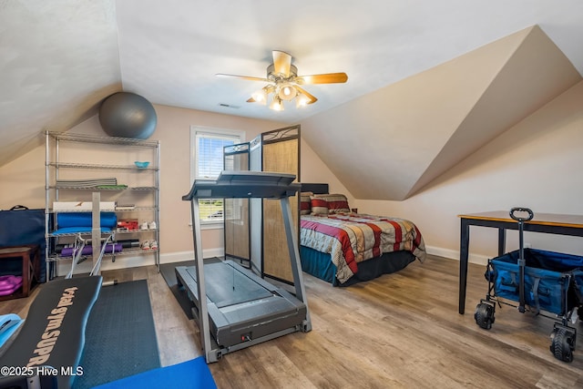 118 Durant St, Hertford, NC 27944 - exercise room with lofted ceiling, wood finished floors, baseboards, and ceiling fan