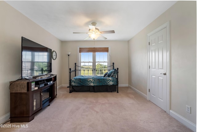 118 Durant St, Hertford, NC 27944 - bedroom with light colored carpet, baseboards, and a ceiling fan