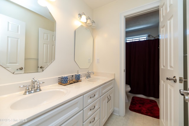 118 Durant St, Hertford, NC 27944 - bathroom featuring double vanity and toilet