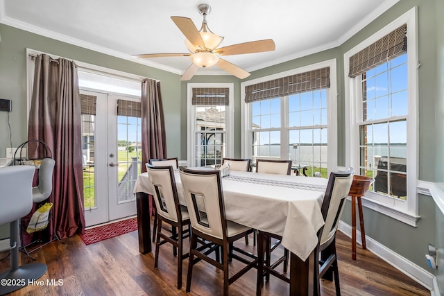 118 Durant St, Hertford, NC 27944 - dining area with french doors, ornamental molding, dark wood-style flooring, a ceiling fan, and baseboards