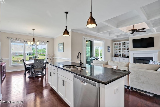 968 Woodwind Dr, Leland, NC 28451 - kitchen with stainless steel dishwasher, a sink, healthy amount of natural light, dark wood-type flooring, and beam ceiling