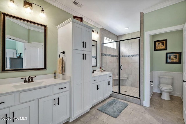 968 Woodwind Dr, Leland, NC 28451 - full bath with vanity, a shower stall, toilet, ornamental molding, and tile patterned flooring