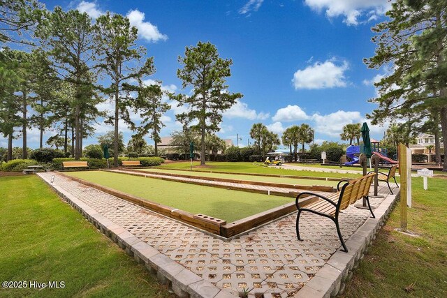 968 Woodwind Dr, Leland, NC 28451 - view of home's community featuring a game area and a lawn