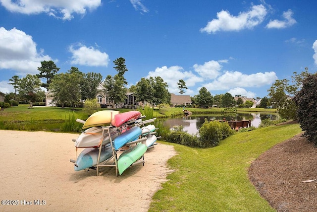 968 Woodwind Dr, Leland, NC 28451 - view of jungle gym featuring a water view and a yard