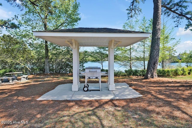 968 Woodwind Dr, Leland, NC 28451 - view of patio with a water view and area for grilling