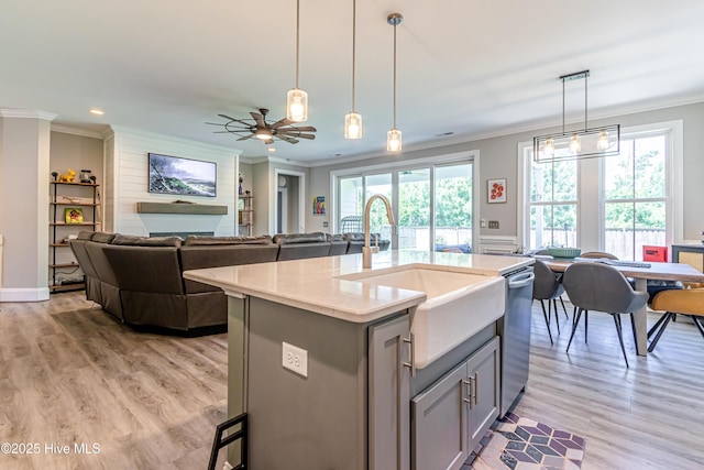 90 N Lamplighters Walk, Hampstead, NC 28443 - kitchen with gray cabinets, a sink, crown molding, hanging light fixtures, and a ceiling fan