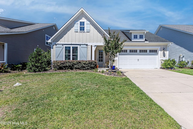 90 N Lamplighters Walk, Hampstead, NC 28443 - view of front of property with board and batten siding, an attached garage, a front yard, and driveway