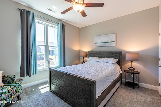 90 N Lamplighters Walk, Hampstead, NC 28443 - bedroom featuring carpet floors, baseboards, and a ceiling fan