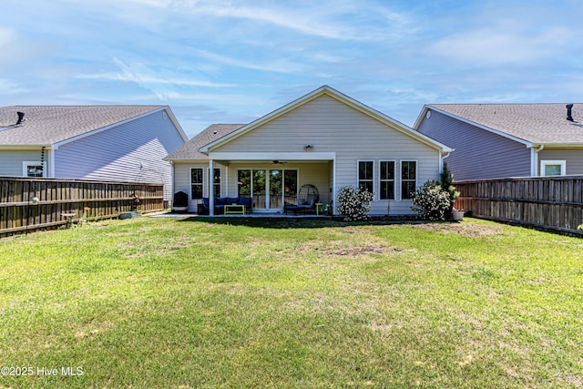 90 N Lamplighters Walk, Hampstead, NC 28443 - rear view of house featuring a ceiling fan, outdoor lounge area, and a patio