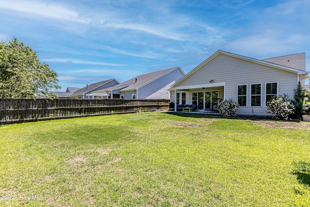 90 N Lamplighters Walk, Hampstead, NC 28443 - back of house with a ceiling fan and a patio area