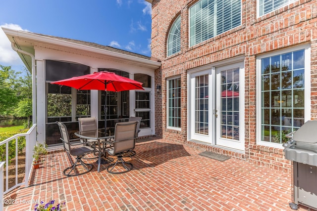6575 Longwater Ct SW, Ocean Isle Beach, NC 28469 - view of patio / terrace with a grill and french doors
