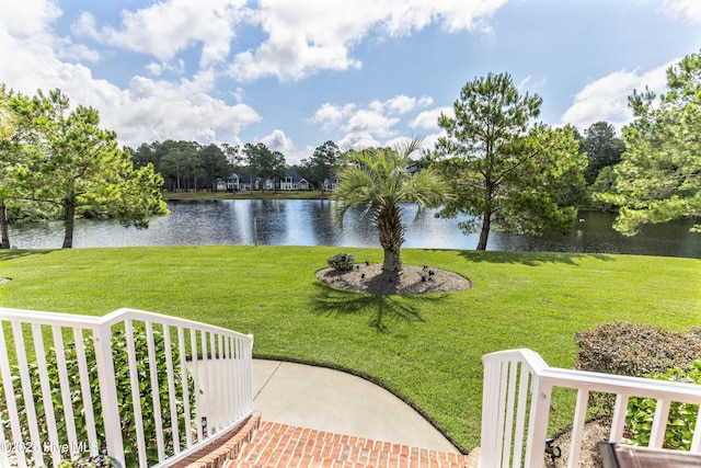 6575 Longwater Ct SW, Ocean Isle Beach, NC 28469 - view of grassy yard with a water view