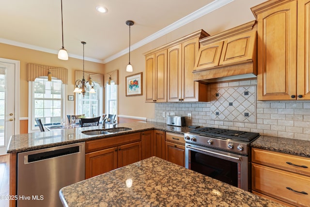 6575 Longwater Ct SW, Ocean Isle Beach, NC 28469 - kitchen with stainless steel appliances, a sink, a peninsula, custom exhaust hood, and backsplash