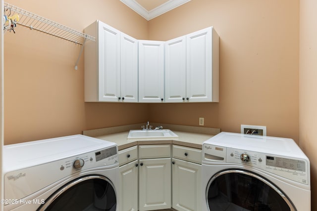 6575 Longwater Ct SW, Ocean Isle Beach, NC 28469 - laundry room with cabinet space, crown molding, and washing machine and clothes dryer