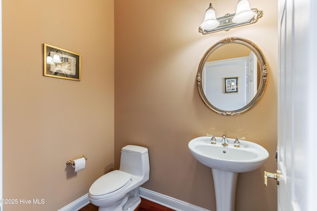 6575 Longwater Ct SW, Ocean Isle Beach, NC 28469 - bathroom with toilet and baseboards