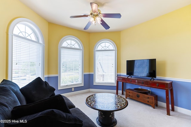 6575 Longwater Ct SW, Ocean Isle Beach, NC 28469 - living area featuring carpet floors, ceiling fan, and baseboards