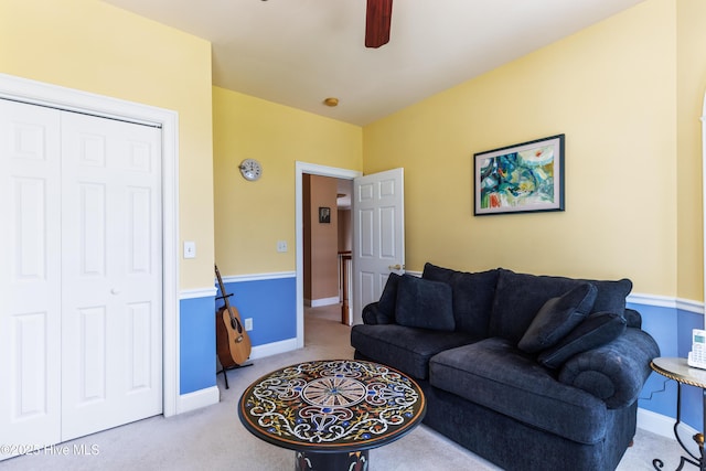 6575 Longwater Ct SW, Ocean Isle Beach, NC 28469 - carpeted living room featuring ceiling fan and baseboards