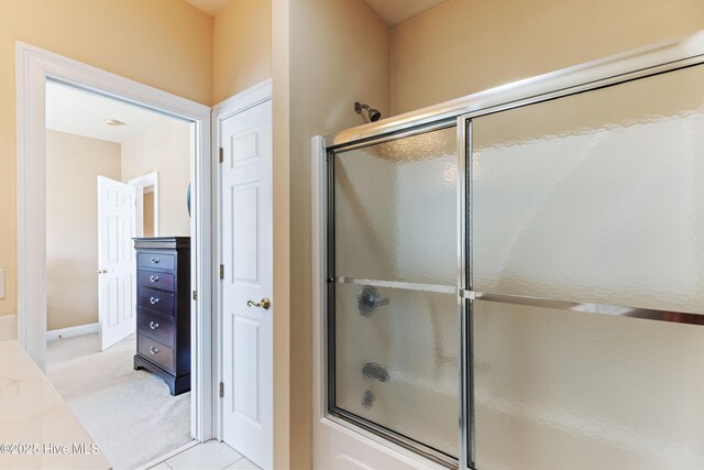 6575 Longwater Ct SW, Ocean Isle Beach, NC 28469 - full bathroom featuring bath / shower combo with glass door