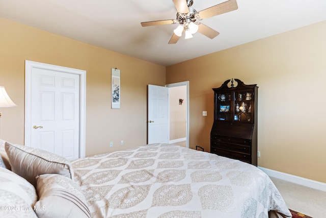 6575 Longwater Ct SW, Ocean Isle Beach, NC 28469 - carpeted bedroom featuring baseboards and a ceiling fan