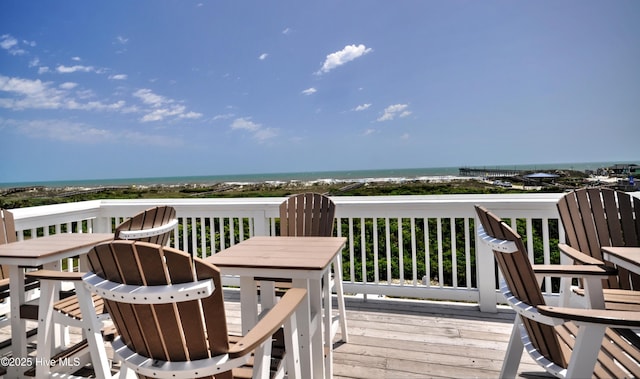6575 Longwater Ct SW, Ocean Isle Beach, NC 28469 - wooden terrace with a water view and outdoor dining area
