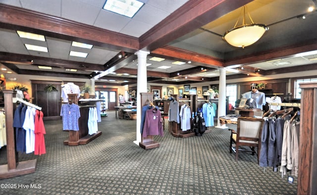 6575 Longwater Ct SW, Ocean Isle Beach, NC 28469 - gym with ornate columns, beamed ceiling, carpet flooring, and coffered ceiling