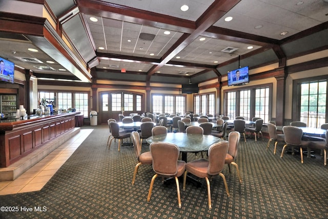 6575 Longwater Ct SW, Ocean Isle Beach, NC 28469 - carpeted dining space featuring coffered ceiling, beamed ceiling, and recessed lighting