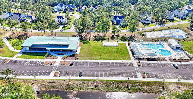6575 Longwater Ct SW, Ocean Isle Beach, NC 28469 - bird's eye view of a pool and a large body of water