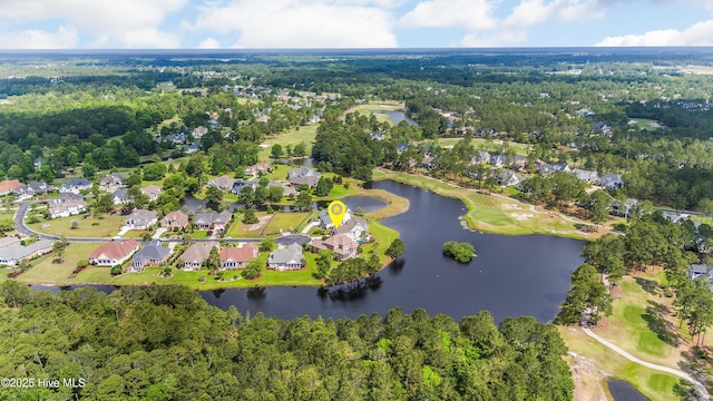 6575 Longwater Ct SW, Ocean Isle Beach, NC 28469 - aerial view of property and surrounding area with a nearby body of water, nearby suburban area, and a local golf course