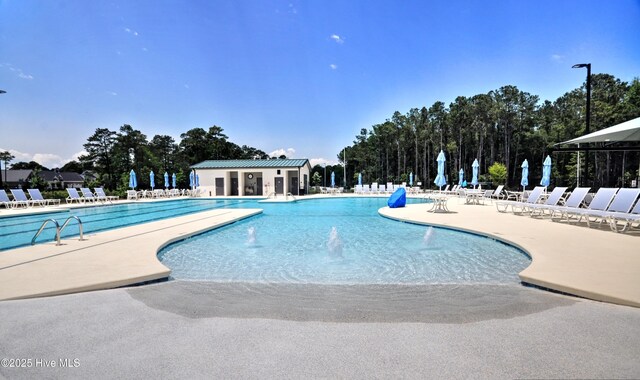 6575 Longwater Ct SW, Ocean Isle Beach, NC 28469 - community pool with a patio area