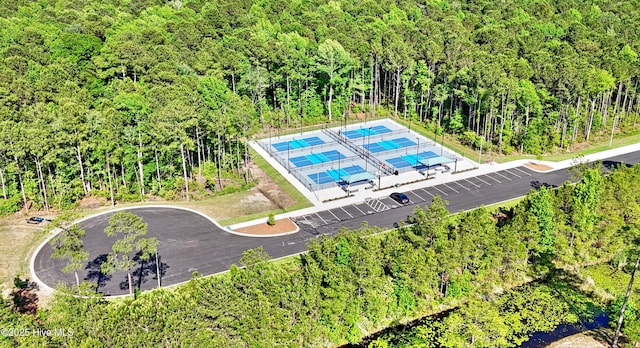 6575 Longwater Ct SW, Ocean Isle Beach, NC 28469 - bird's eye view of a heavily wooded area
