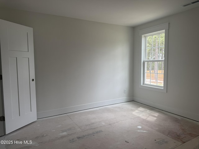 empty room with baseboards