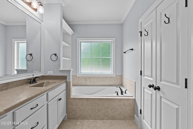 full bathroom with a garden tub, vanity, tile patterned floors, and ornamental molding