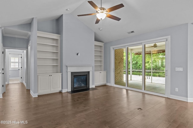 unfurnished living room featuring ceiling fan, baseboards, a fireplace with flush hearth, dark wood-style flooring, and high vaulted ceiling