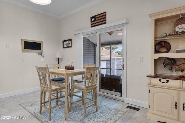 101 Mallard Dr, Currituck, NC 27929 - dining area with crown molding and baseboards