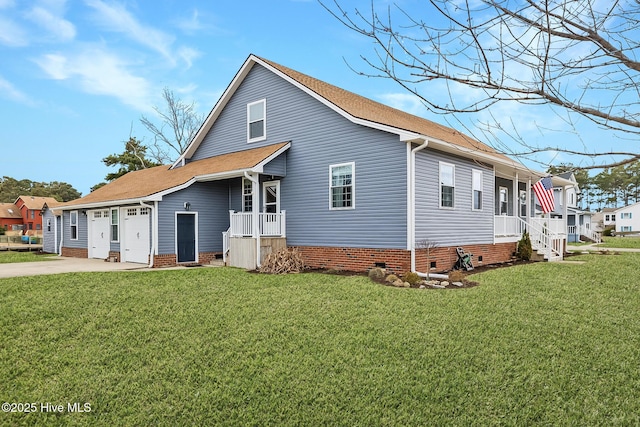 101 Mallard Dr, Currituck, NC 27929 - view of front facade with crawl space, driveway, a front yard, and roof with shingles