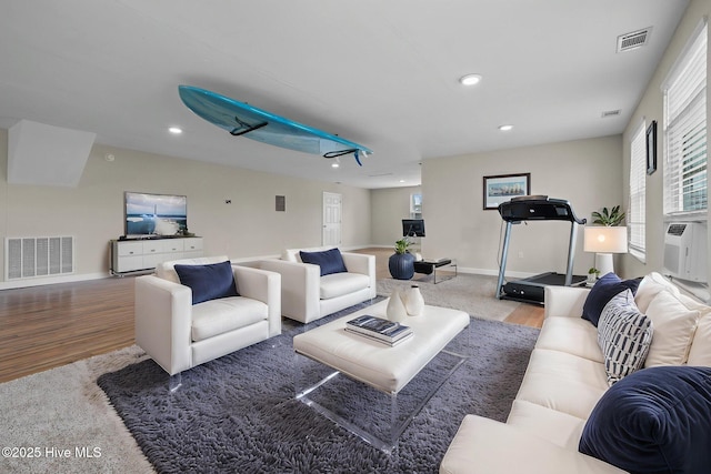 101 Mallard Dr, Currituck, NC 27929 - living area with wood finished floors, recessed lighting, baseboards, and cooling unit