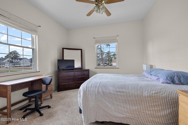 101 Mallard Dr, Currituck, NC 27929 - bedroom featuring light carpet, a ceiling fan, and a desk