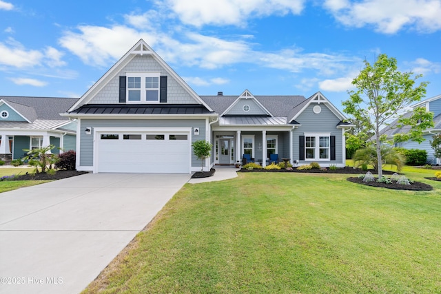 3032 Beachcomber Dr, Southport, NC 28461 - craftsman inspired home with a front yard, driveway, a standing seam roof, and metal roof