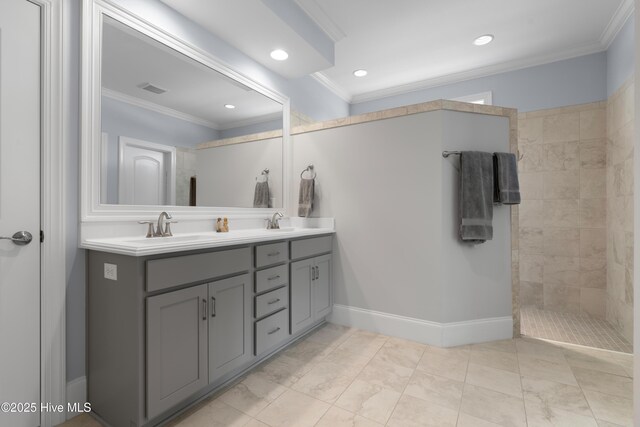 3032 Beachcomber Dr, Southport, NC 28461 - full bathroom with a walk in shower, double vanity, crown molding, recessed lighting, and baseboards