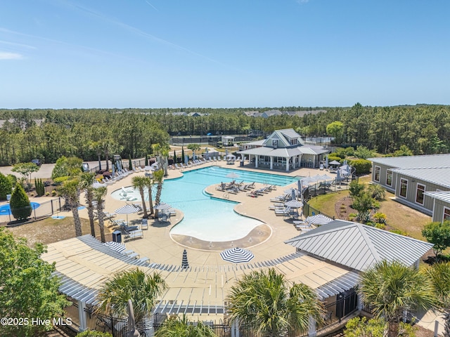 3032 Beachcomber Dr, Southport, NC 28461 - community pool with a patio area and fence