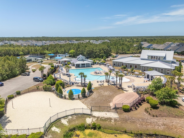 3032 Beachcomber Dr, Southport, NC 28461 - aerial perspective of suburban area with a pool area