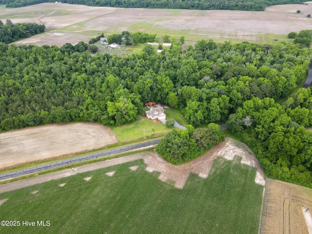 aerial view of property and surrounding area featuring rural landscape