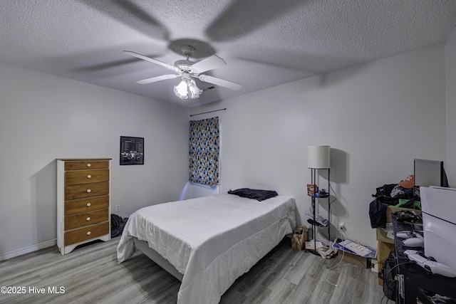 2726 S 17th St Unit C, Wilmington, NC 28412 - bedroom with wood finished floors, a textured ceiling, ceiling fan, and baseboards