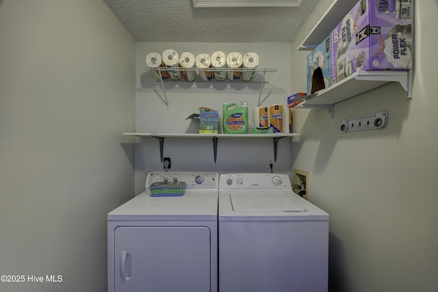2726 S 17th St Unit C, Wilmington, NC 28412 - washroom with washing machine and clothes dryer and a textured ceiling