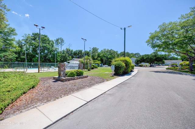 2726 S 17th St Unit C, Wilmington, NC 28412 - view of asphalt road with street lighting, curbs, and sidewalks
