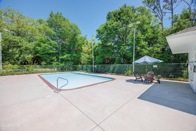 2726 S 17th St Unit C, Wilmington, NC 28412 - view of pool featuring a patio and view of scattered trees